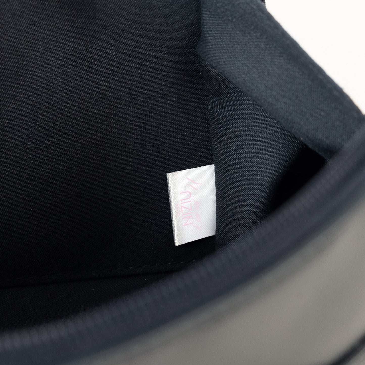 POUCH / NiziU『Live with U 2025 “NEW EMOTION : Face To Face”』